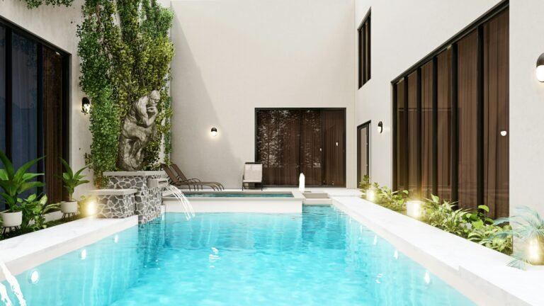 Renovated courtyard pool with lighting and modern finishes
